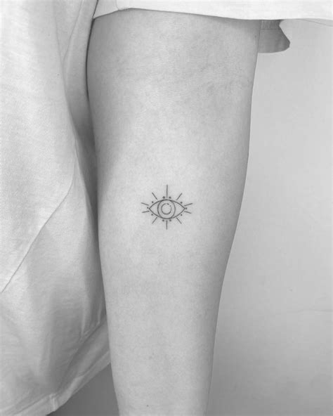 Evil Eye Tattoo Located On The Inner Forearm