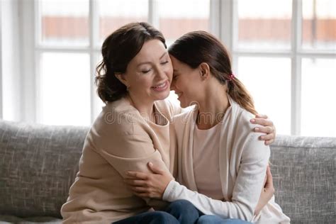 Happy Older Mom And Adult Daughter Hugging At Home Stock Image Image