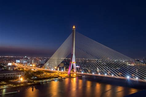 Premium Photo | Rama 8 bridge at night in bangkok