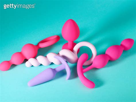 Set of pink anal plug toys over blue turquoise background 이미지 2022859395 게티이미지뱅크