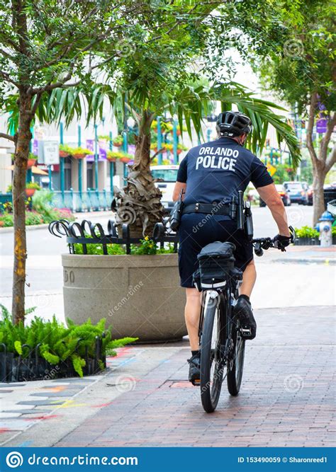 Orlando Police Bicycle Cop Patrolling The Downtown Area Editorial Stock Image Image Of