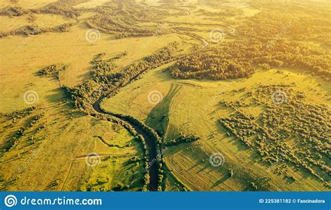 Fields And Small Narrow Winding River Aerial View Stock Photo Image