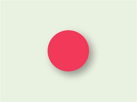 A Red Circle On A Light Green Background