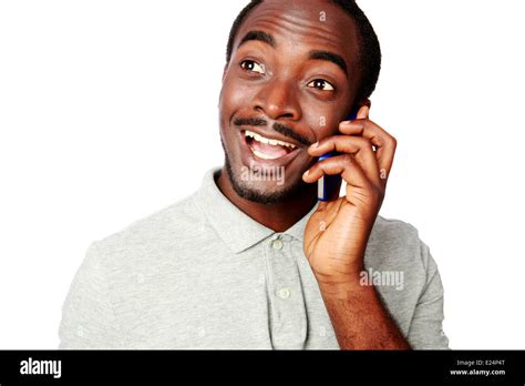 Funny african man talking on the phone isolated on a white background Stock Photo - Alamy