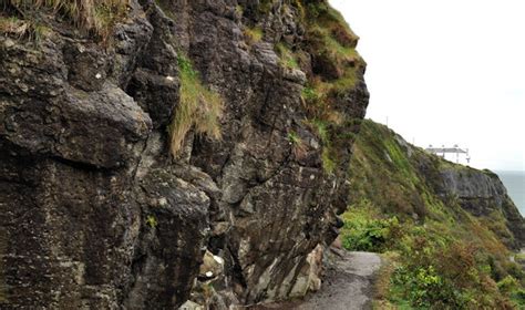 Cliff And Lighthouse Whitehead © Albert Bridge Geograph Britain And