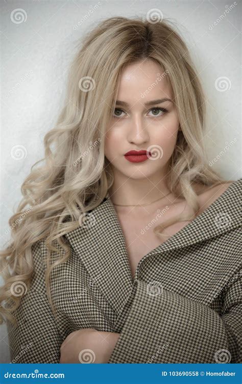 Fashion Blonde Woman Standing Against Wall Stock Photo Image Of Cool Hands