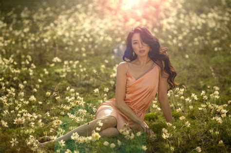 4k Asian Grass Bokeh Brunette Girl Sitting Dress Hands