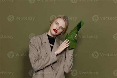 Blonde Woman Red Lips Palm Leaf Charm Fashion Studio Model Unaltered Stock Photo At