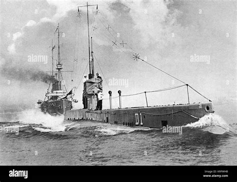 British submarine "D 1" with H.M.S. "Drake" following in her wake. All the latest British ...