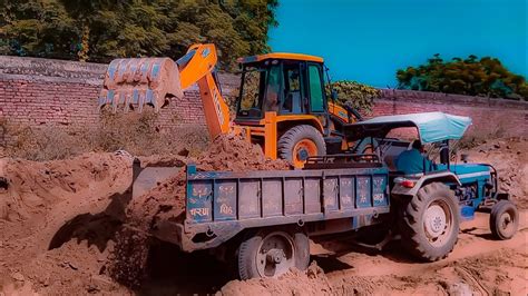 Jcb 3dx Eco Excellence Machine Loading Mud In Farmtrac 45 Tractor Jcb