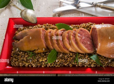 Zampone Boiled And Stuffed Pigs Trotter On Lentils Italian Stock