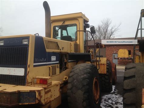 Three Komatsu Wheel Loaders