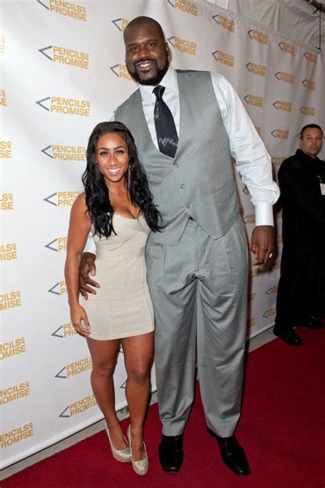 Shaquille Oneal At 7 Feet 2 Inches Towers Over His 5 Foot 2 Inch