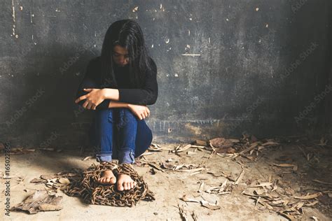 Trapped Woman Young Woman Trapped In Chains Covering Face With Hands