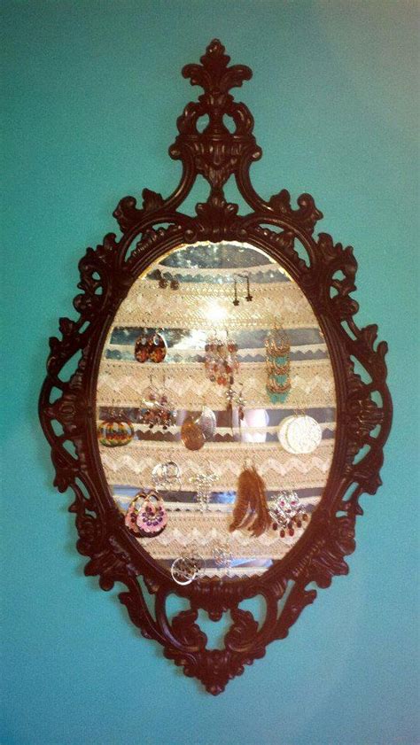 This was an old mirror I made into a jewelry holder for my daughter. | Old mirror, Jewelry ...