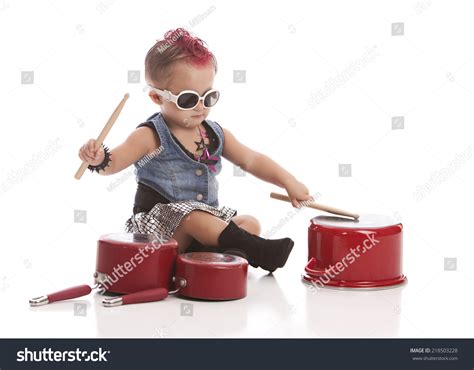 Rock And Roll Baby Adorable Toddler With A Pink Mohawk And Banging On