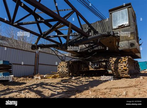 Old Crawler Crane At A Construction Site Excavator Tracks Covered In