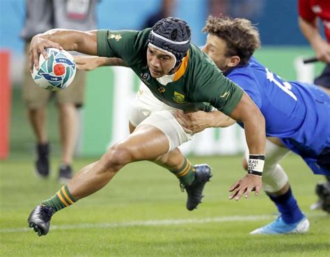 South Africa's Cheslin Kolbe scores a try during the Rugby World Cup ...