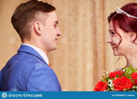 Russian Bride And Groom In The Room At Home In Ordinary Interior Of