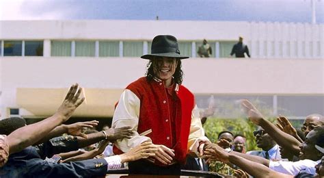 Michael Jackson being greeted by 125,000 natives in Gabon, Africa on ...