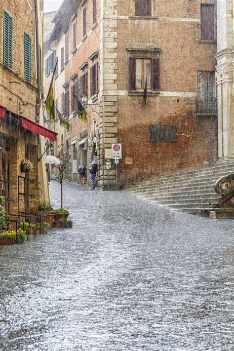 Pouring Rain On A Small City Street In An Italian Village Stock Image