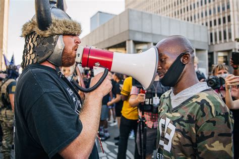 Opposing groups confront each other at Kentucky Derby protest - TheGrio