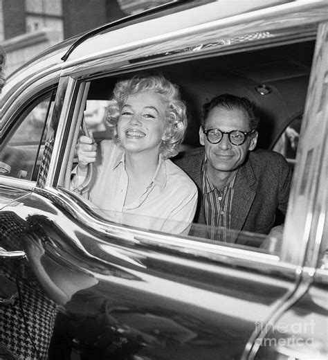 Marilyn Monroe And Arthur Miller In Car By Bettmann