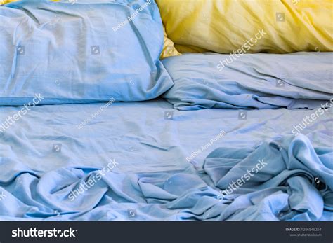 Empty Messy Unmade Bed Blue Sheets Stock Photo 1286549254 Shutterstock
