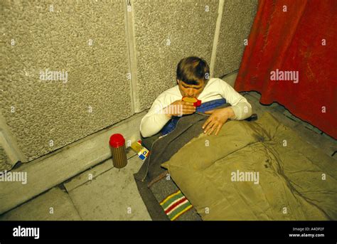 A Homeless Man Drinking A Cup Of Tea From A Flask Stock Photo Alamy