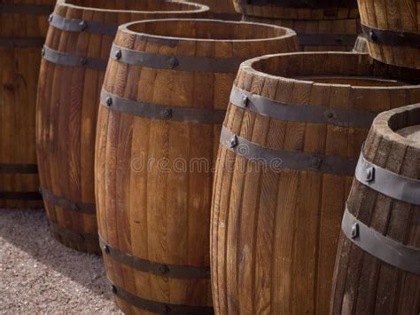 Wooden Barrels In A Row Wine Barrels In Cellar Stock Image Image Of