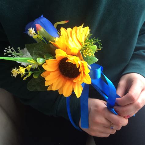 A Collection Of Wedding Bouquets Featuring Sunflowers And Royal Blue