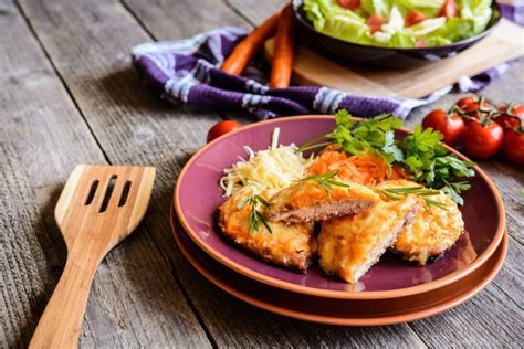 Berbackene Schweineschnitzel Mit Zwiebeln Und K Se