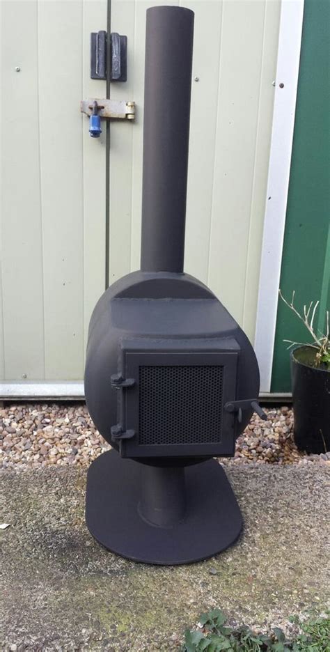 Gas Bottle Wood Burner Chimenea In Garden Patio Barbecuing Outdoor