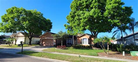 Single Family Residence in Oviedo, Florida - Cover B Realtor