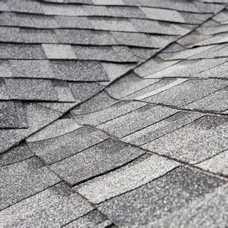 new roof shingles not laying flat