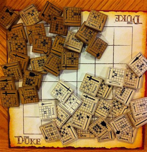 A Board Game With Wooden Pieces On Top Of It And The Words Duke Written