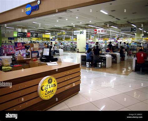 ANGONO, RIZAL, PHILIPPINES - AUGUST 12, 2017: Stores, shops, cafes and ...