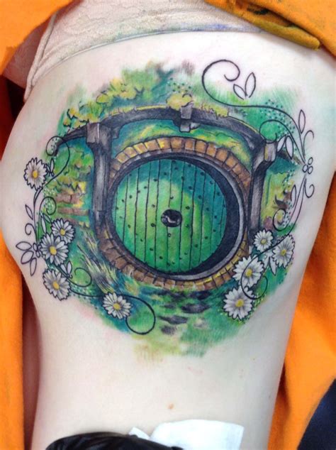 FYeahTattoos.com — My amazing Hobbit door tattoo on my ribcage right...