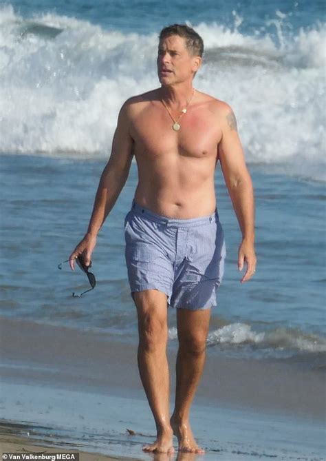 Rob Lowe Bares His Muscles As He Goes Shirtless For A Walk On The