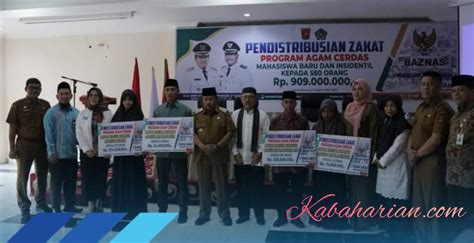 Program Agam Cerdas Pemkab Bersama Baznas Agam Distribusikan Zakat