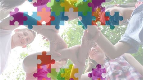 Animation Of Multicolored Puzzle Pieces Diverse Children Holding Hands