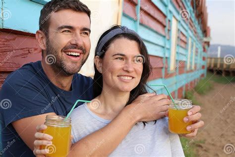 Cute Couple Drinking Orange Juice Outdoors Stock Image Image Of