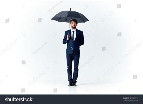 23 562 Man Holding Umbrella Images Stock Photos Vectors Shutterstock