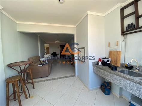 Vende apartamento semimobiliado 1 suíte e 2 dormitórios na praia de