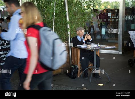 Gentleman Working At A Table At The Bfi Cafe On The Southbank South