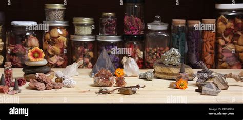 Meditation Altar With Rock Crystals And Flowers Jars Of Herbs In