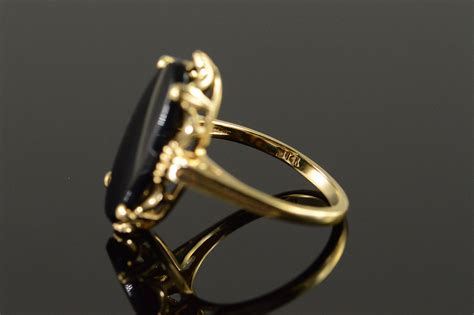 K G X Mm Oval Black Onyx Yellow Gold Ring Size Property Room