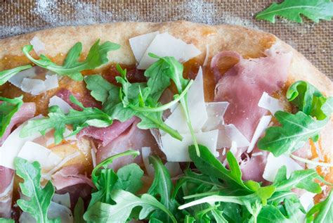 Prosciutto Parmesan And Arugula Flatbread With Fig Jam Spread