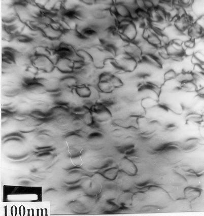 Tem Micrograph Of Orowan Dislocation Bowing Passing Particles