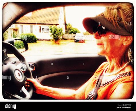 Lady driving a Smart Car Stock Photo - Alamy